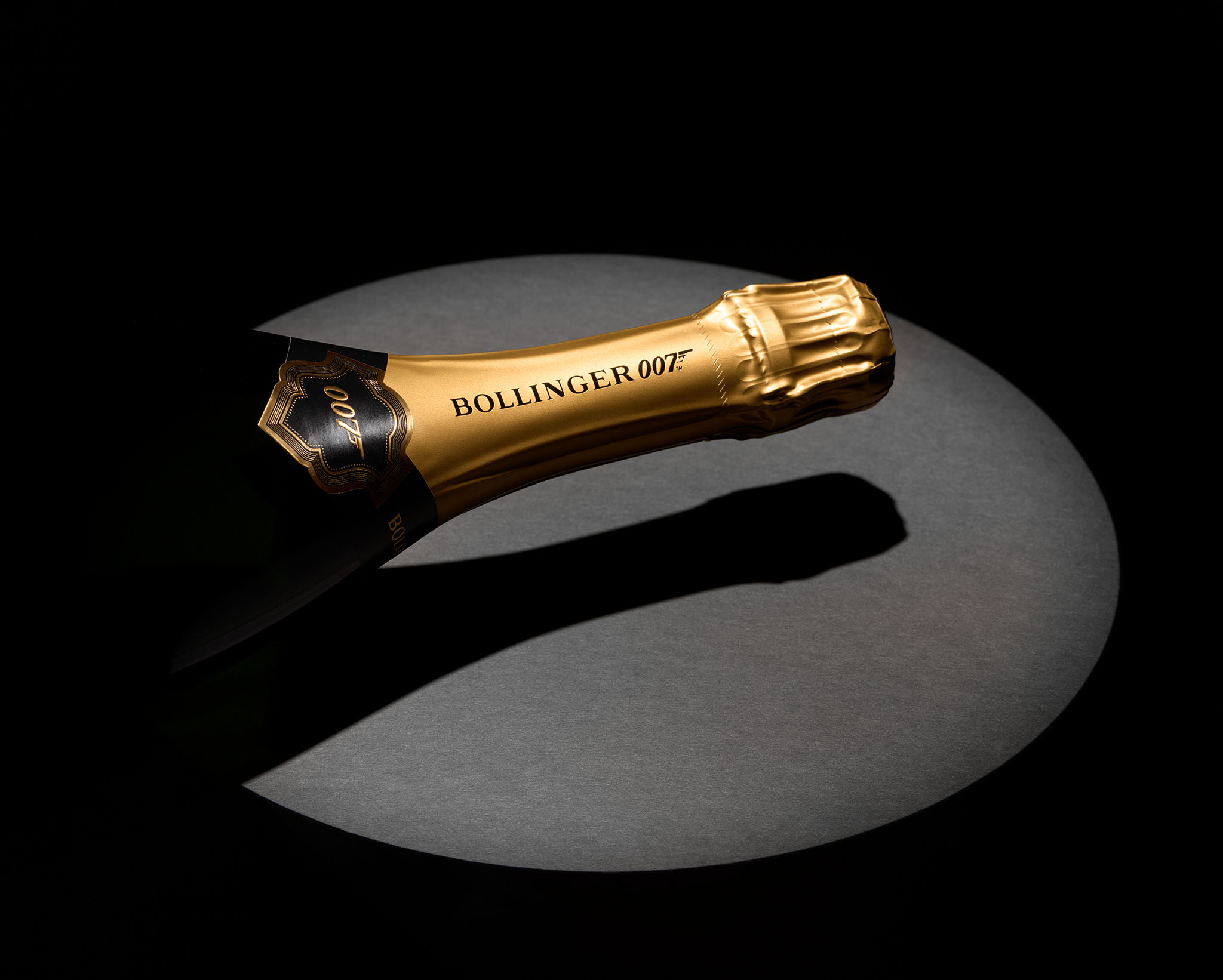 Bollinger Champagne product showing foil top, photography for James Bond 007 promotion, spotlight with circle of light